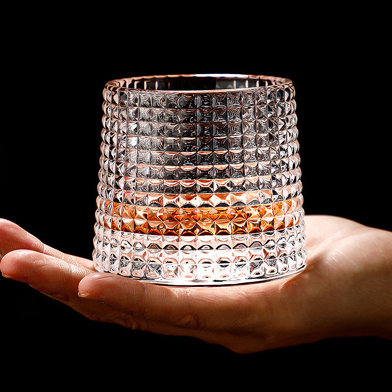 Thickened rotating tumbler whiskey glass
